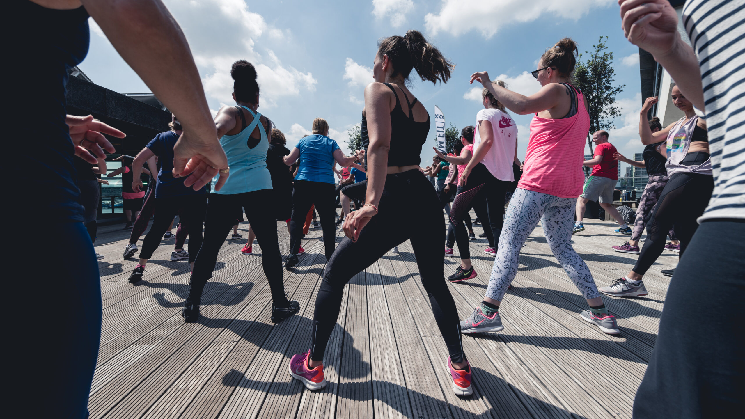 People dance Zumba on the roof at Sir. Adam, next to Eye museum & the Adam Tower in Amsterdam. 3 july 2018